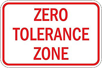 Metal sign with the words Zero Tolerance Zone